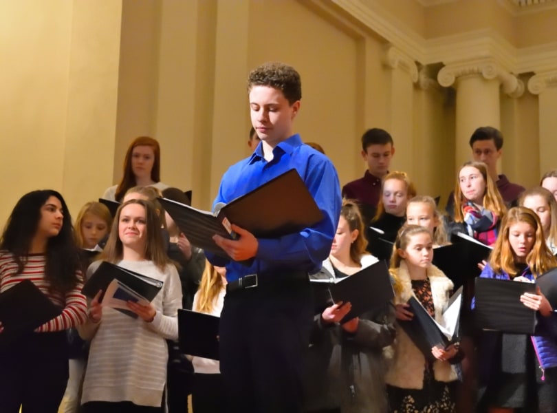 Teen sings with choral group